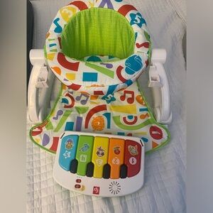 Fisher price kick and play